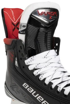 Bauer Vapor X5 Pro Senior Hockey Skates 12 Bauer Vapor X5 Pro Senior Hockey Skates -Hockey Sale Shop 1061681 BTH23 SKATE VAPOR X5PRO SR tongue detail edit ce05c9ed 3e31 4c9f bc36 e2487c7fe019